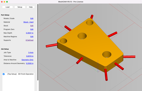 MeshCAM supports (red tabs) holding a triangular part with three holes to the surrounding stock